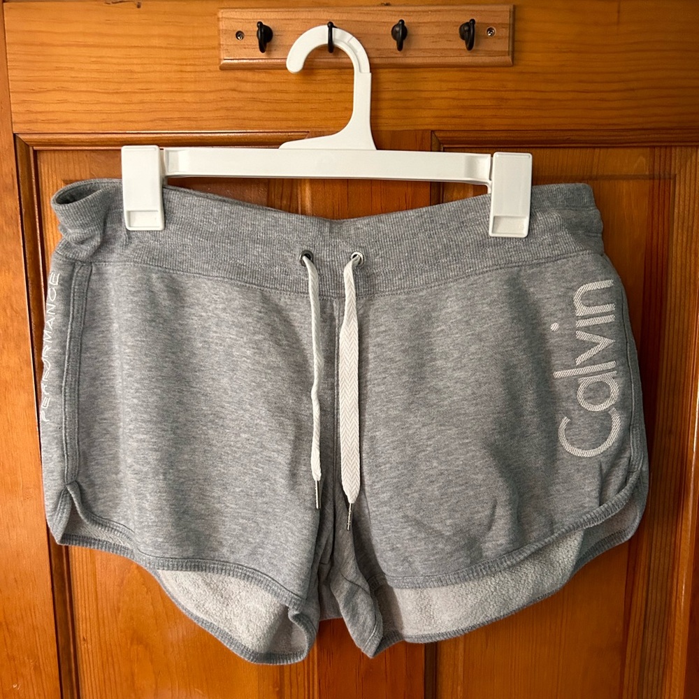 Size Large Clavin Klein Grey Sweatpant shorts with Drawstring tie.